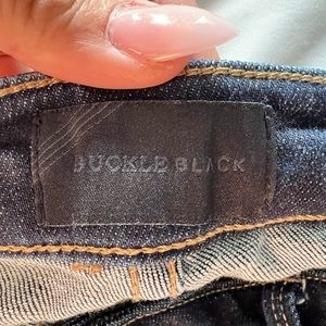 Never been worn buckle black jeans!